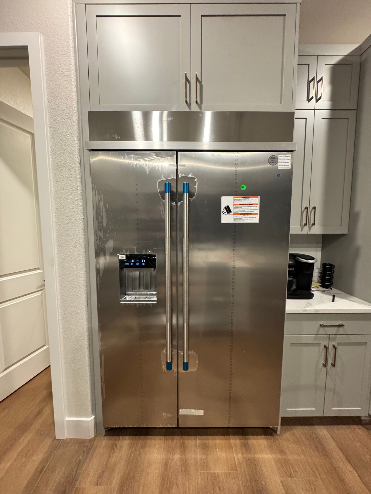 Built-in refrigerator in a home kitchen