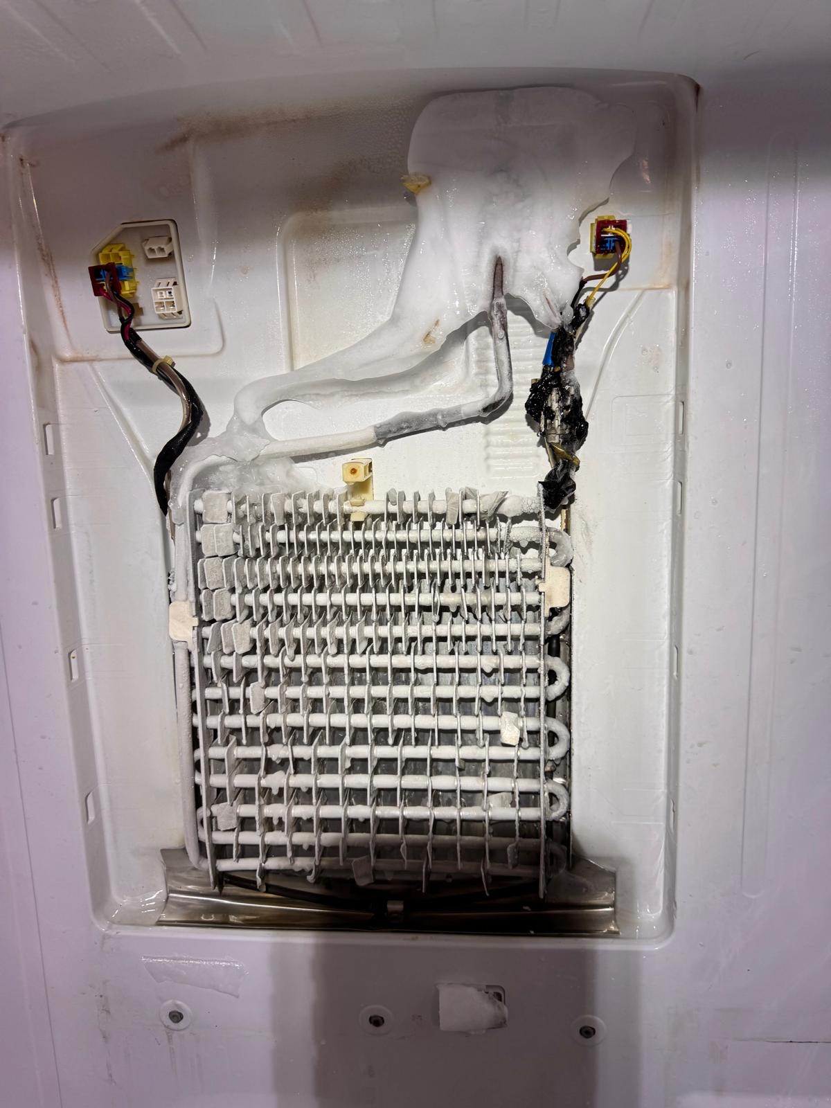 Ice buildup around an exposed refrigerator evaporator