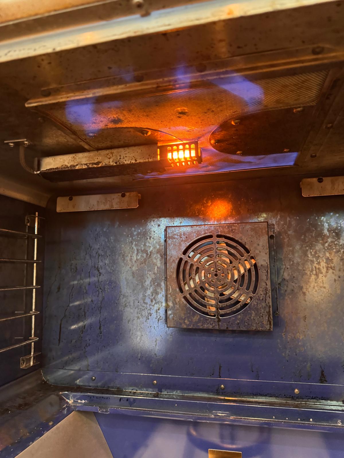 Gas broiler and igniter during an oven service visit
